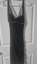 Pre owned in good condition black formal dress small