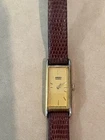 Vintage Goldtone Seiko Womens Slim Watch with leather band 1986