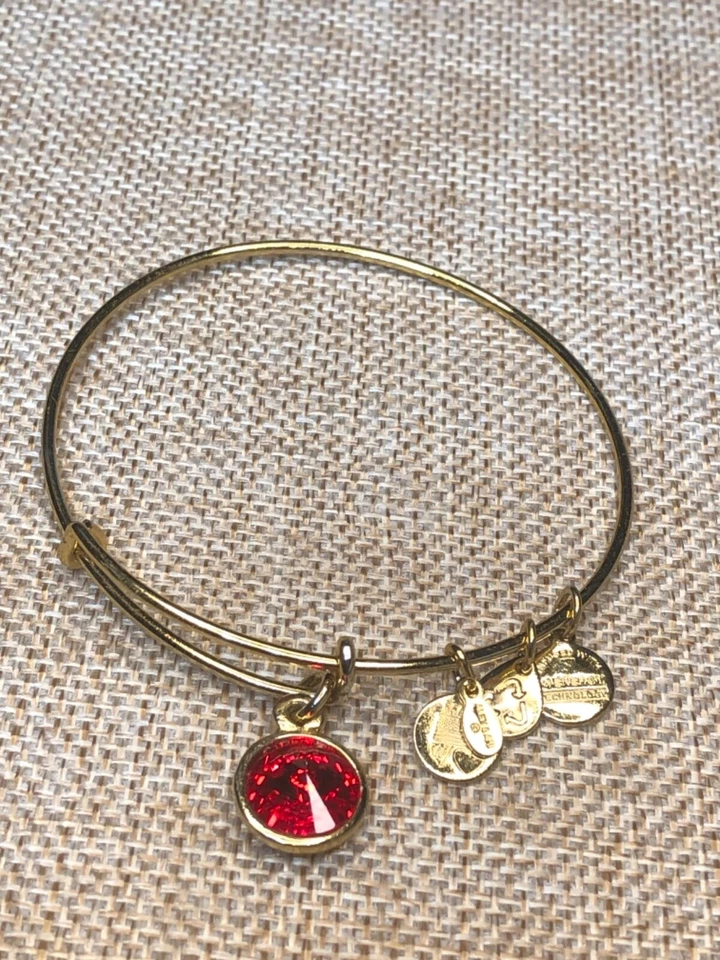 Brazalete expandible dorado piedra natal de julio Alex And Ani  Foto 2 de 4