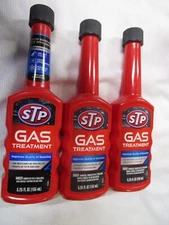 3 Bottles STP gas treatment bottled fuel system cleaner 5.25 oz.