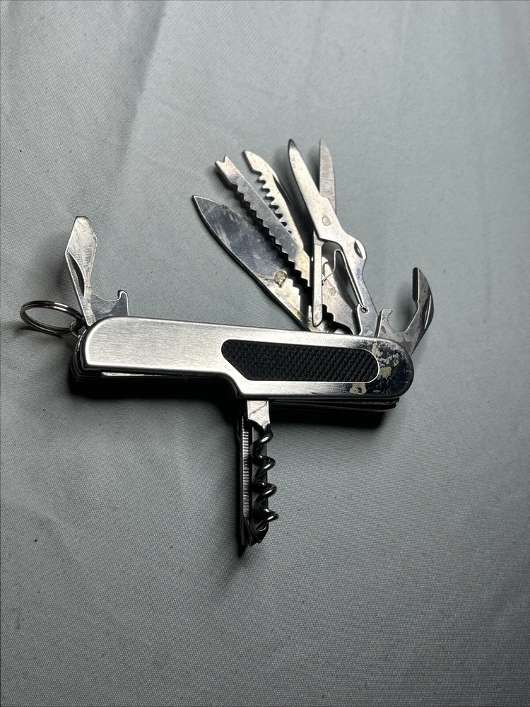 Multi Tool Swiss Army knife With Screw Driver Cork Open And More! ELEVEN Tools!