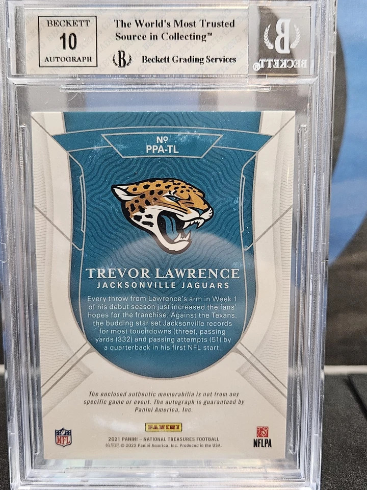 2021 NATIONAL TREASURES PRODIGY PATCH AUTOS TREVOR LAWRENCE /99 BGS 8 AUTO 10 - Image 3 of 3