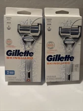 (2) Gillette SkinGuard Men's Razor Sensitive Skin Handle +2 Refill Cartridges 