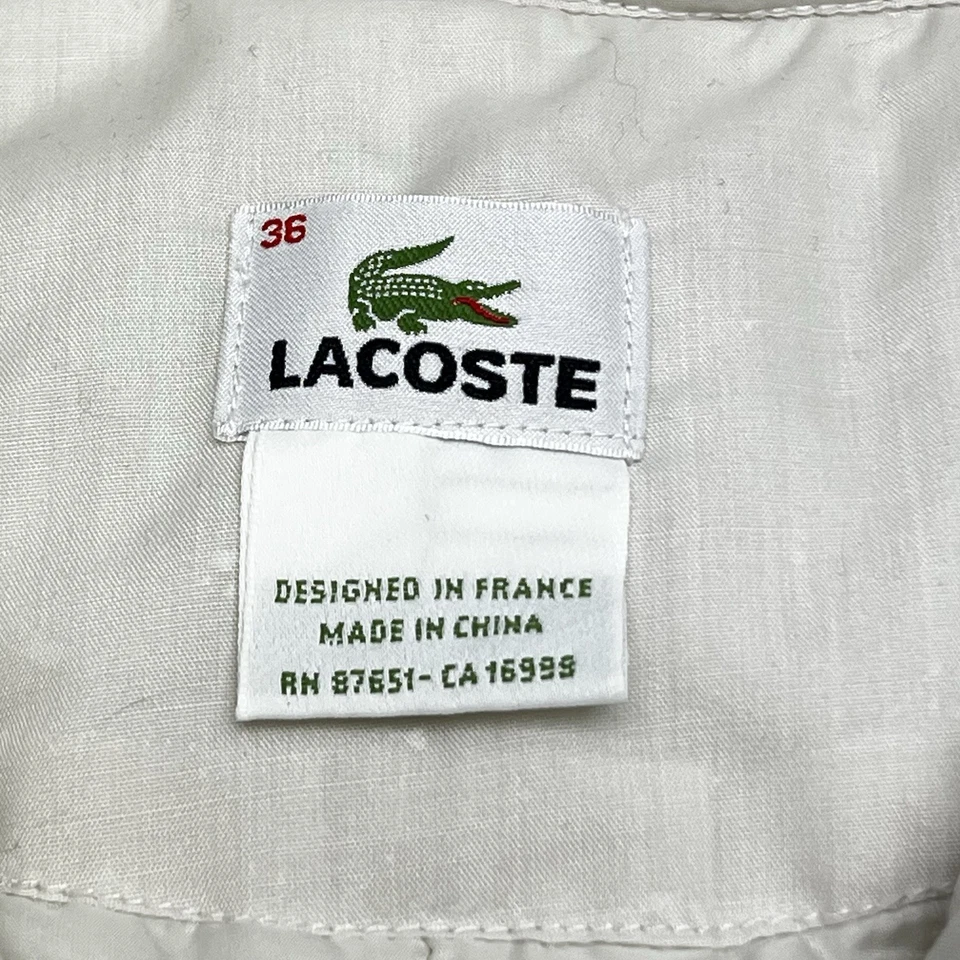 Chaleco deportivo Lacoste para mujer 36 pequeño marfil cremallera completa chaqueta bolsillos acolchados golf Foto 3 de 4