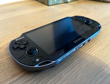 Sony PlayStation Vita PCH-1003 Black Handheld System with Wi-Fi Capability