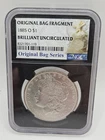 1885-O Morgan Silver Dollar NGC Brilliant Uncirculated – Original Bag Fragment