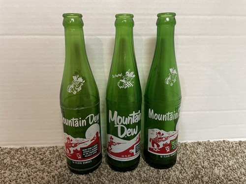 Lot of 3 Vintage Mountain Dew Empty Bottles 10 fl. oz. includes Laughing Pig