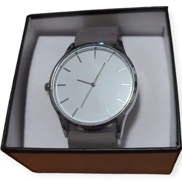 KATHERINE KARAMBELAS New Wrist watch with a oversized face and