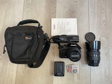 Olympus E-420 camera with lenses Olympus 18-180mm f/3.5-6.3  Olympus 14-42