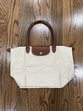 Longchamp Tote Paper Color Never Used No tags...