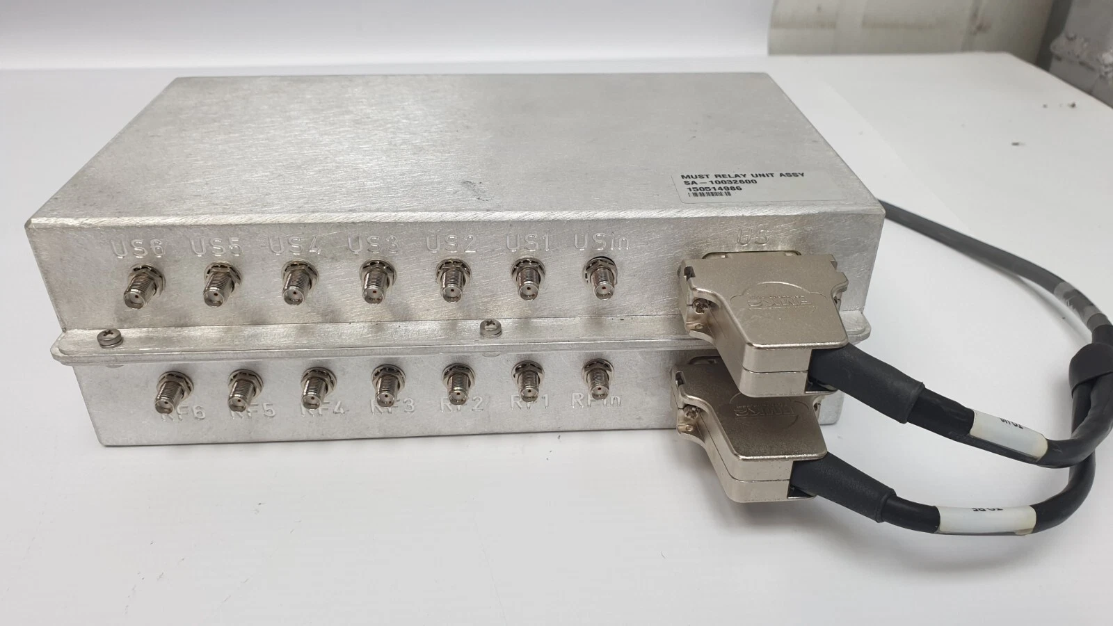 SMA ports marked US6-US1, USin and RF6-RF1, RFin on the relay unit