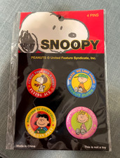 Reduced Snoopy Peanuts Red Baron pin set. New in sealed pack. Nice 