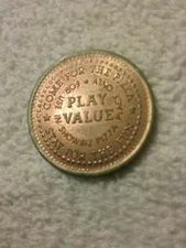 PINK SHOWBIZ PIZZA PLACE BRASS TOKEN CHUCK E CHEESE 