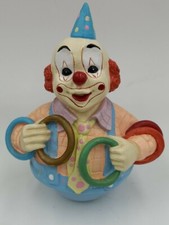VINTAGE ROTATING MUSICAL CLOWN