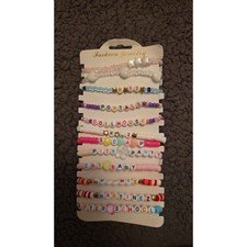 Girls Lot of 24 Bracelets, 1 Press-On Nails,  1 Lipstick. All New in Wrappers.