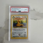 1999 Pokemon Fossil Dragonite Holo PSA 8 NM-MT 4/62