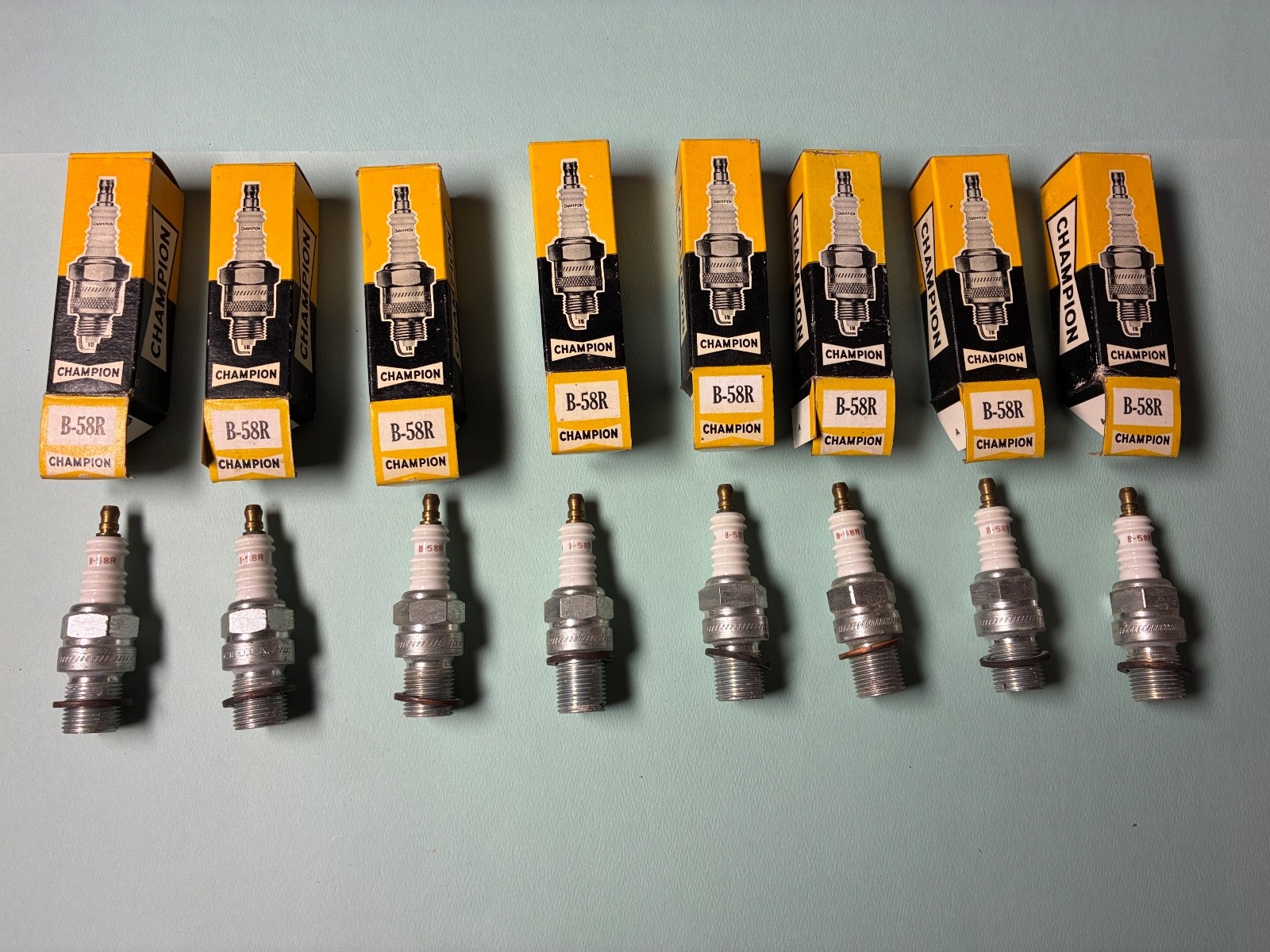 New Old Stock Champion B-58R Spark Plugs in original packaging, lot of 8