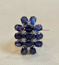 Features Royal Blue Oval Cut 10.14CT Sapphires Lab-Created Diamond Flower Ring