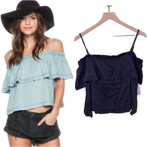 black ruffle shoulder top