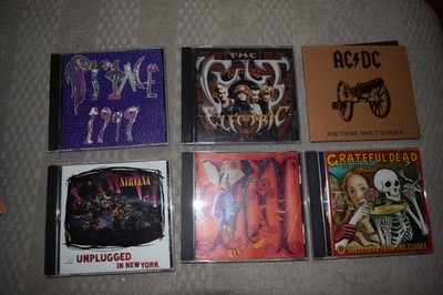 LOT OF 6 ROCK, HEAVY METAL COMPACT DISC'S, AC/DC, THE CULT, NIRVANA, ETC. EXCELL