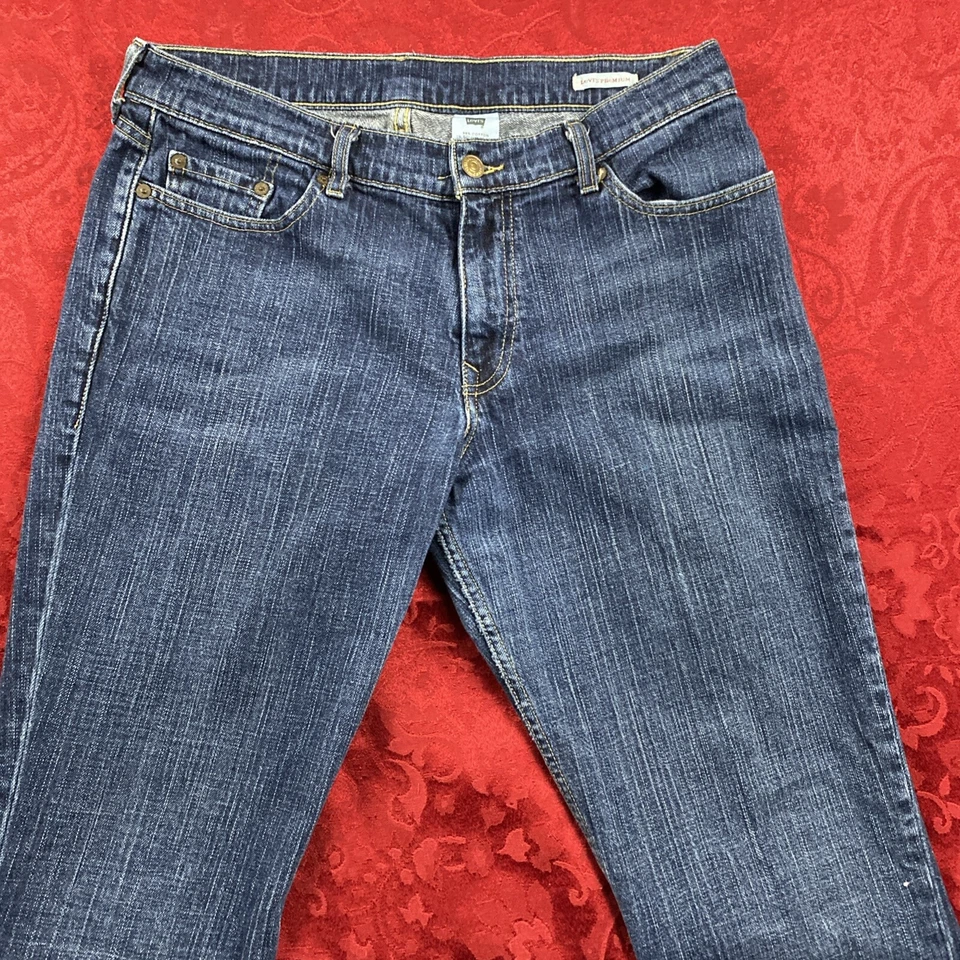 Pantalones de mezclilla Levi’s Premium súper bajos para mujer talla 33M Bootcut azul lavado de colección Foto 3 de 4
