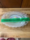 Beautiful iridescent glass bowl has a ruffled edge and swirl pattern. — photo 3