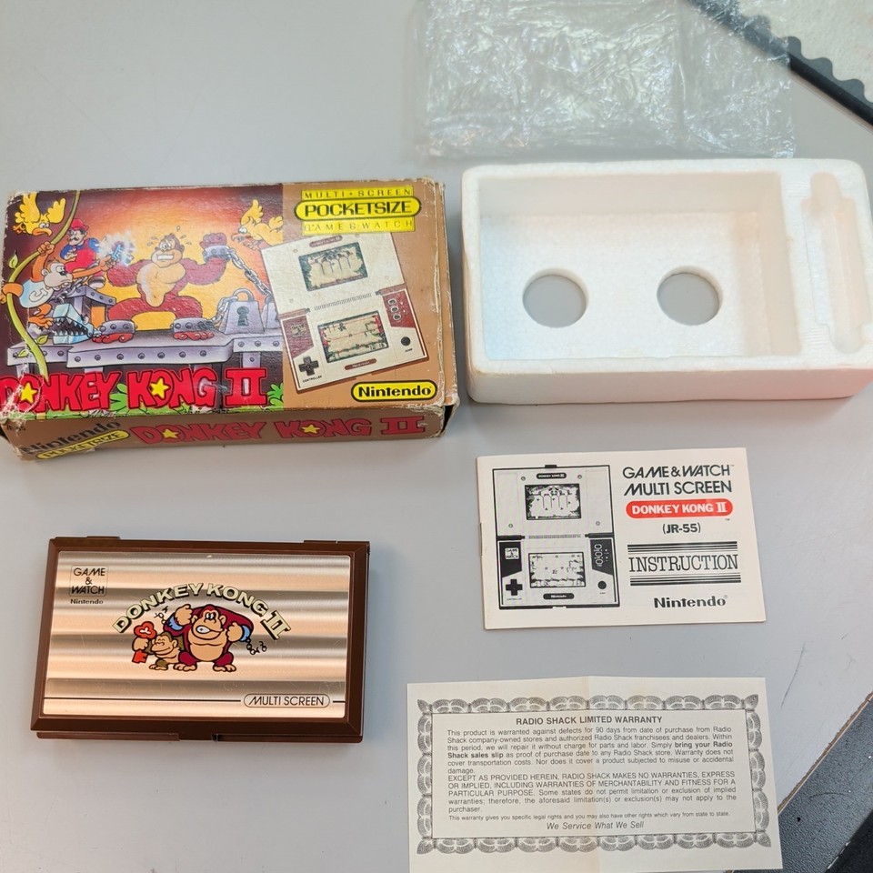 An original boxed Game & Watch Donkey Kong II from the '80s — the pocket game that defined portable gaming before the Game Boy, and it still looks incredible.