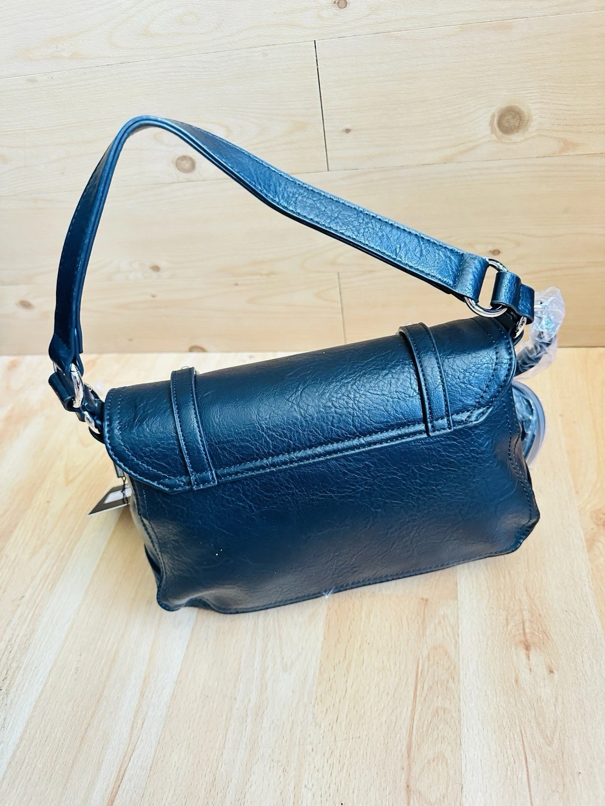 Borsa Juicy Couture nera con patta di loto con mini borsa abbinata