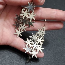 Silver tone Metal snowflake earrings