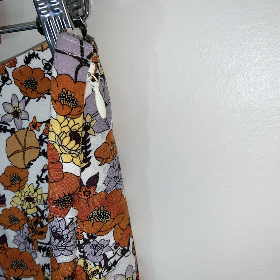 Falda midi plisada de seda Tory Burch para mujer 10 marfil flor ditsy floral diseñador Foto 3 de 4