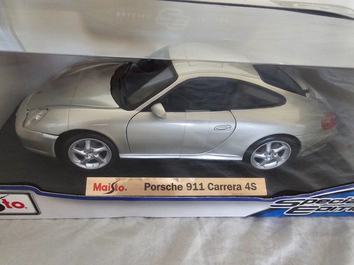 Porsche 911 Carrera 4S (996) In Silver By Maisto Diecast Model 1