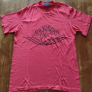 navy blue and pink nike shirt