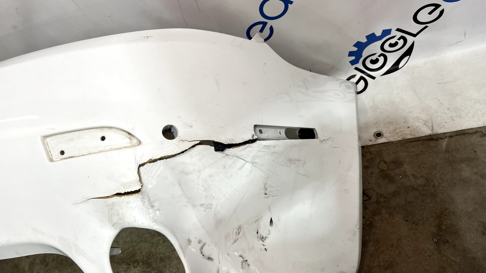 ASTON MARTIN VANTAGE V8 REAR BUMPER 2011 OEM -needs repaired at front edge-