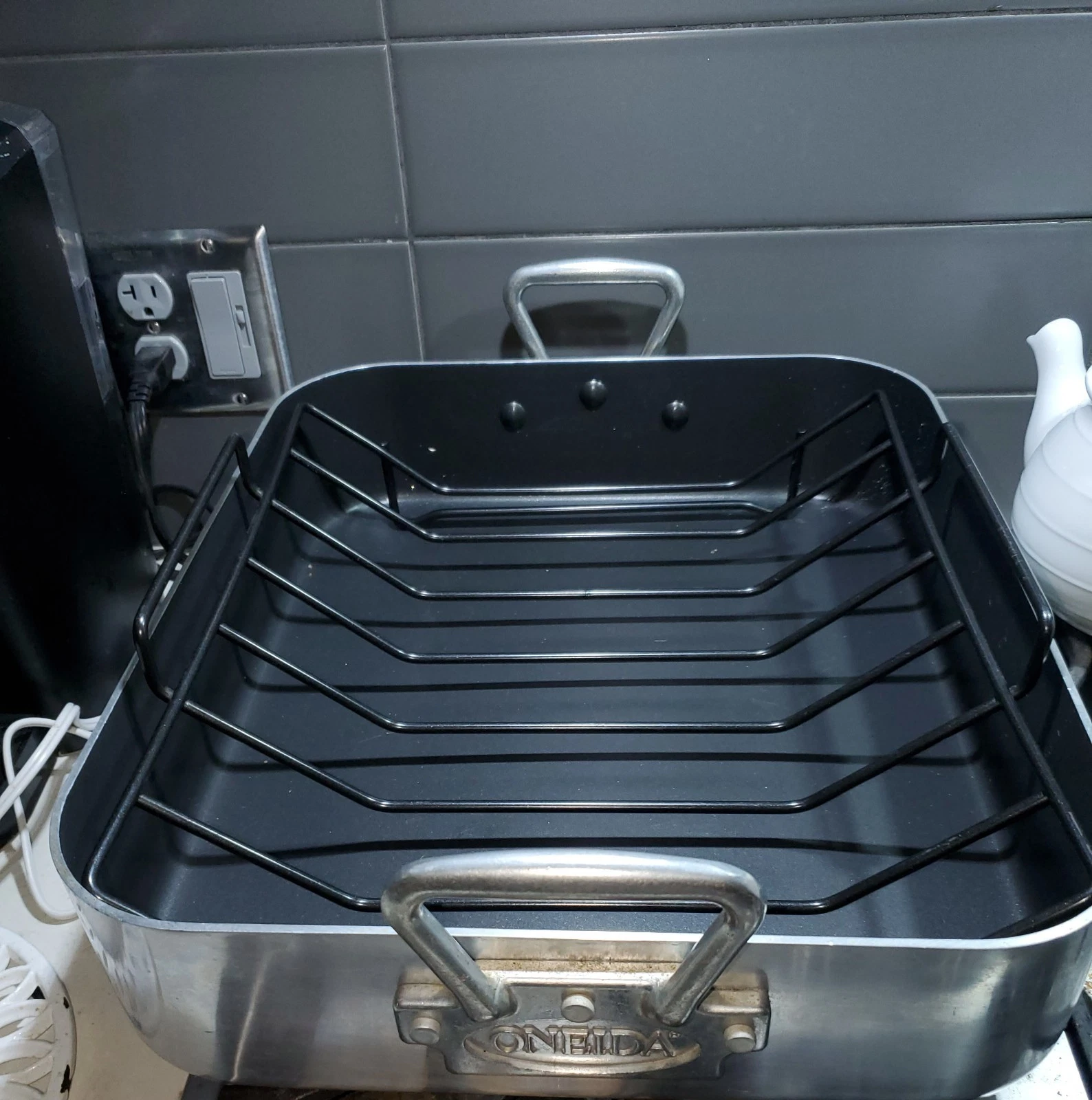 XL Oneida Roasting Pan featuring a dark, nonstick interior & black metal rack