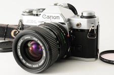 Near MINT Canon AE-1 SLR Film Camera NFD 35-70mm f/3.5-4.5 MF Zoom Lens JAPAN