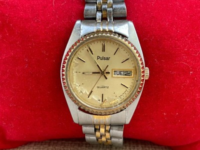 Montre-bracelet vintage Pulsar pour femme double ton or/argent