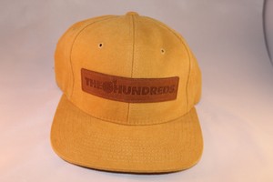 snapback hat with leather strap