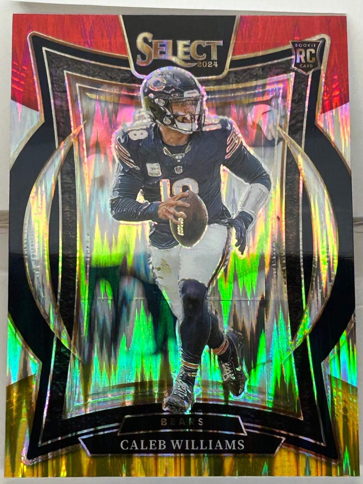 2024 Panini Select #25 Caleb Williams Red & Yellow Prizm Shock Rookie RC