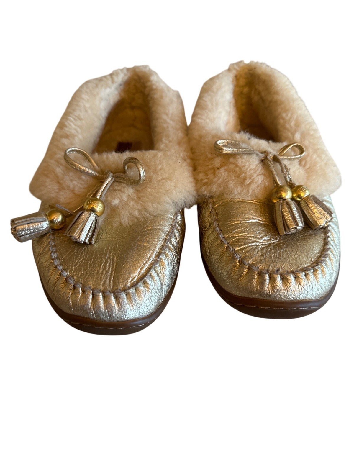 PANTOFOLA D’ORO Pantofole Coach donna foderate in shearling oro con accenti di nappa e suole in gomma