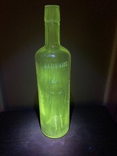 Amidon's Naked Lady Brandy Bottle. MANGANESE GLASS UV REACTIVE GLOW. RARE!