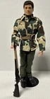 Vintage 1964 HASBRO G.I.JOE with black flocked hair. made in England by palitoy