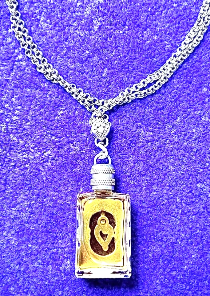 BOTELLA DE PERFUME DE VIDRIO BRILLANTE + CORAZÓN DE PLATA + COLLAR LARGO CON DESPLAZAMIENTO EN MUY BUENA CONDICIÓN + BOLSA✨VTG Foto 2 de 4