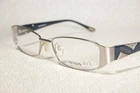 Unworn REVLON 1074 col. 02 Women's Sleek Silver & Blue Eyeglass Frames, Large