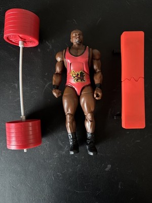 WWE Elite Big E figure with barbell and breakable bench