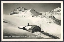 Wiesbadner hut, mountain hut in winter with size Piz Buin, postcard 