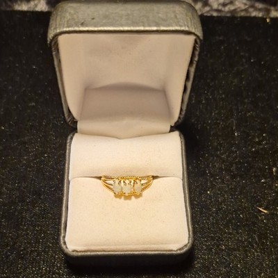 Goldtone Metal Band Ring Size 8 3 s/w  White Oval Opal Stones, Prong Setting