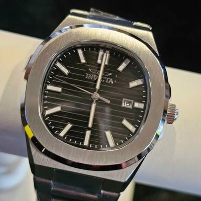 Invicta stainless steel black dial quartz. New in box!