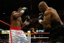 Danny Williams white trunks and Mike Tyson black trunks fights eac- 2004 Photo