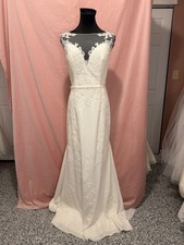 Elegant Morilee Ivory Lace Wedding Dress with Sheer Illusion Neckline and Train