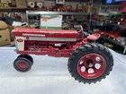 1/16 IH Farmall 560 w/diecast rims Solid Hitch — photo 1
